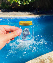 Load image into Gallery viewer, CLEAR STICKER: Manatee In A Jar